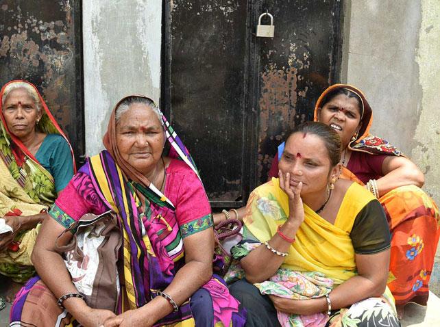 Women in a slum, India