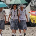 School girls and buses