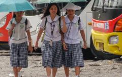 School girls and buses