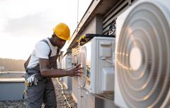 male-holding-tablet-and-installing-cooling-system-2023-12-21-22-00-44-utc-2.jpg