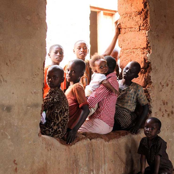 Children sitting in the shade